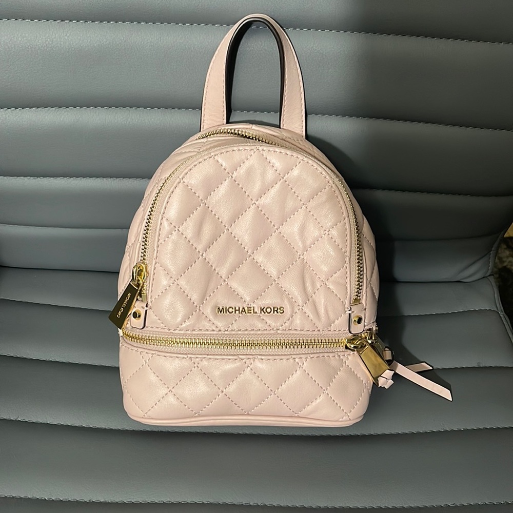 Brand new Michael Kors Mini backpack